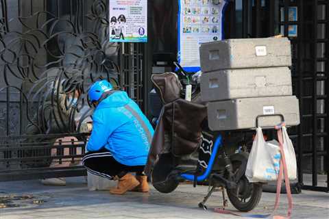 China locks down third city, raising affected to 20 million