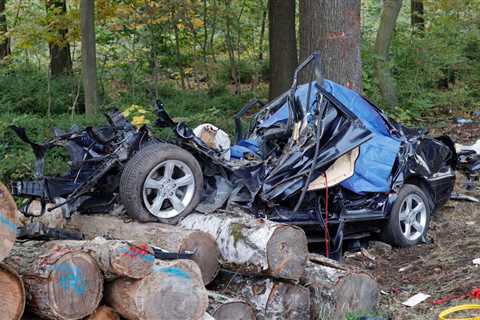 Mercedes crashes into a woodpile close to Freiberg in a horrifying tragedy that leaves two people..