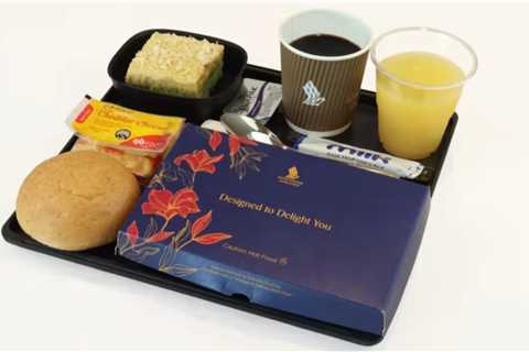 Singapore Airlines is serving meals in paper boxes to Premium Economy and Economy Class passengers..