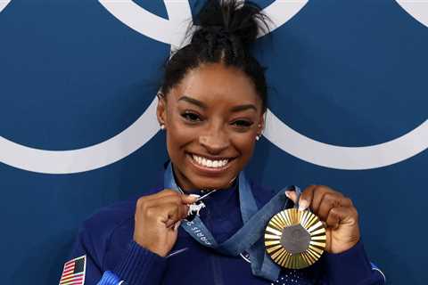 Simone Biles Reveals GOAT Necklace After Winning Second Olympic Gold – Hollywood Life