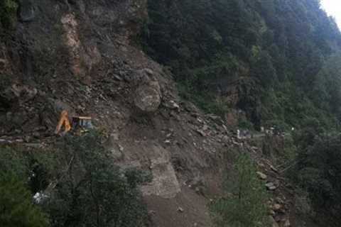 Rain in Tibet: Floods and landslides leave hundreds stranded | World news