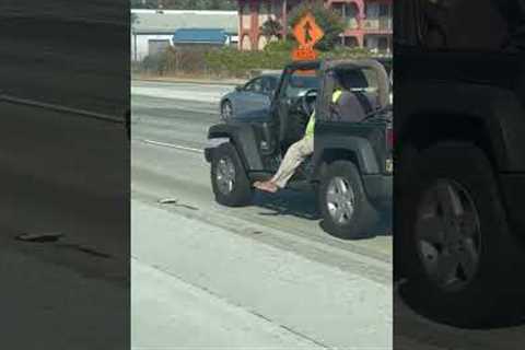 Driver Hangs Foot Loose On Highway